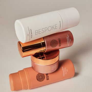 Set of Bespoke skincare products on a neutral background